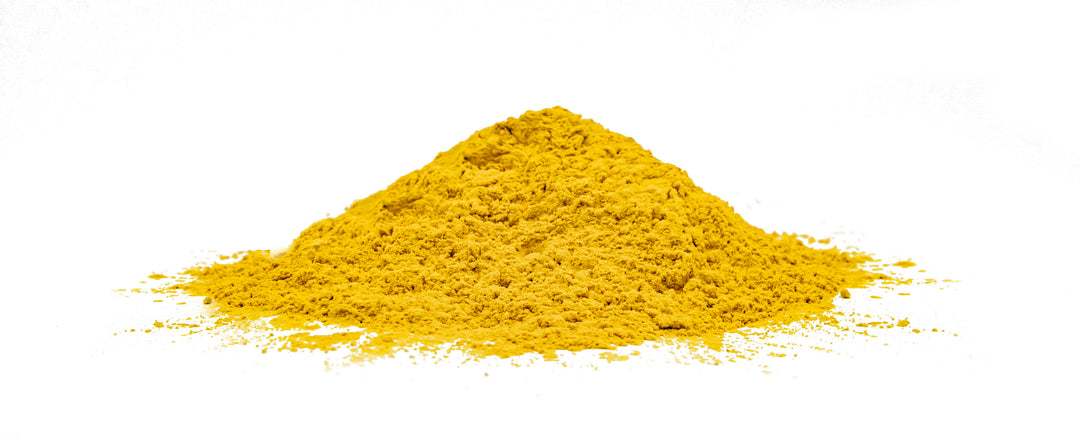 Intensivt gul chokladfärgspulver med kornig textur