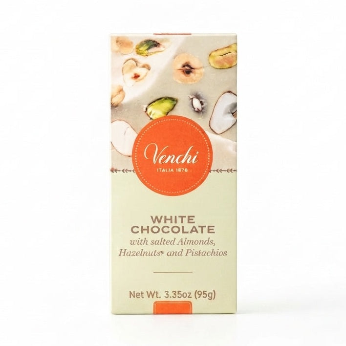 Venchi vit chokladförpackning med orange logga och bild på smält choklad