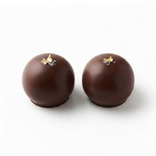 Callebaut mörka chokladpraliner med guldfolie och havssalt