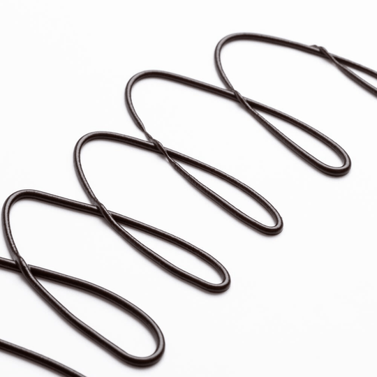 Glossy dark chocolate sauce zigzag drizzle texture