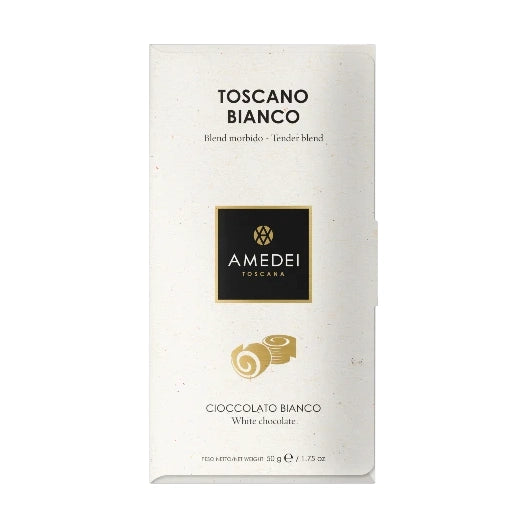 Chokladshopen Amedei Toscano vit choklad 29% i elegant krämvit förpackning med guldlogotyp