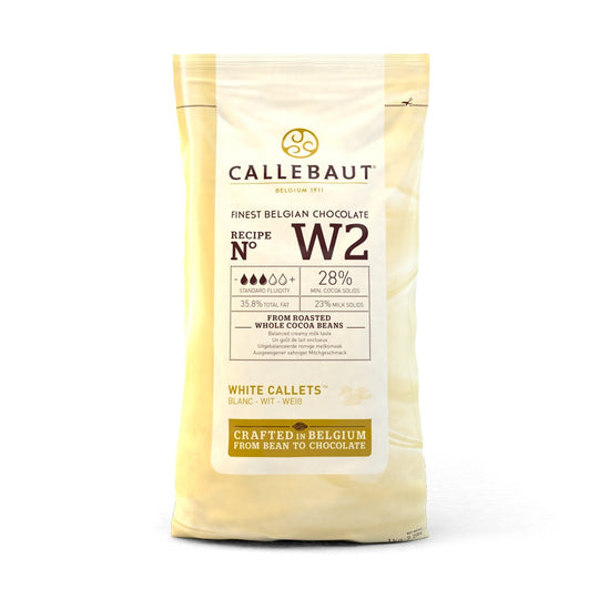 Chokladshopen Callebaut W2 vit chokladcouvertyr i 1kg förpackning med chokladpellets för bakning och praliner.
