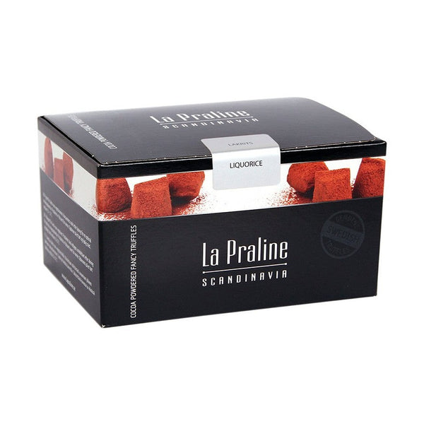 Chokladshopen La Praline tryfflar med lakritssmak i en elegant svart presentask med kakaopudrade tryfflar