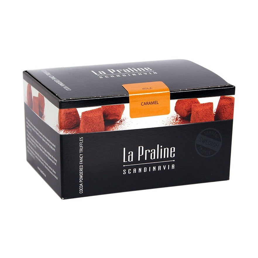 Chokladshopen La Praline tryfflar med salt kola i en elegant svart presentask med kakaopudrade chokladbitar