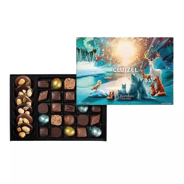 Cluizel julchokladask med handgjorda praliner, vintermotiv och nötter, 335g
